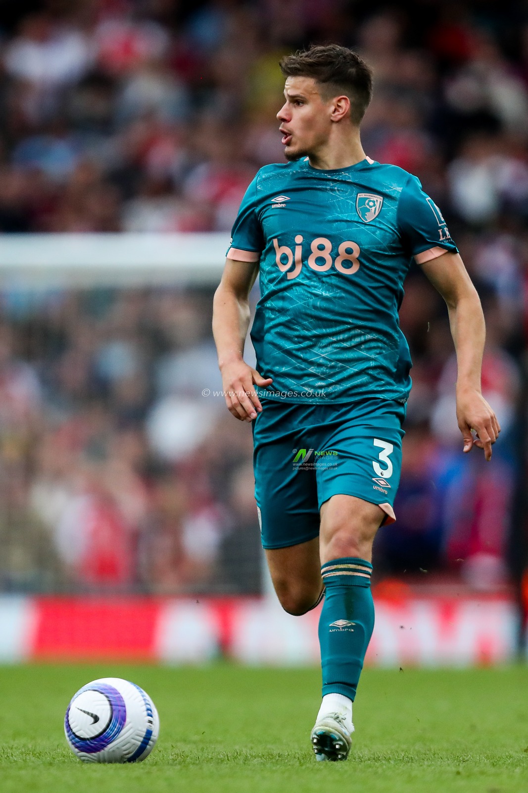 Milos Kerkez of AFC Bournemouth runs with the ball during the Premier League match Arsenal vs Bournemouth at Emirates Stadium, London, United Kingdom, 3rd May 2025

(Photo by Izzy Poles/News Images)