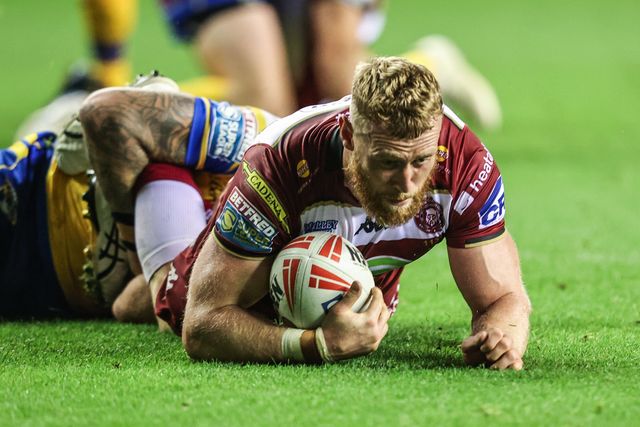 Luke Thompson of Wigan Warriors is tackled during the Betfred Super League round 27 match Wigan Warriors vs Leeds Rhinos at The Brick Community Stadium, Wigan, United Kingdom, 19th September 2025

(Photo by Alfie Cosgrove/News Images)