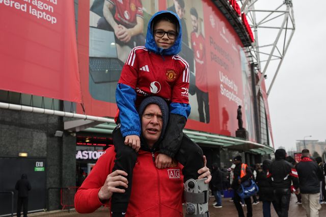 Manchester United fans make their way to Old Trafford during the Premier League match Manchester United vs Aston Villa at Old Trafford, Manchester, United Kingdom on 15 March 2026

(Photo by Mark Cosgrove/News Images)