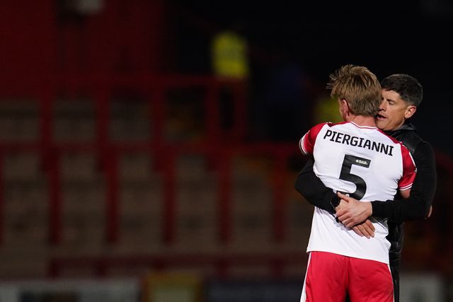 Alex Revell manager of Stevenage and Carl Piergianni of Stevenage celebrate 1-0 win at full time during the Sky Bet League One match Stevenage vs Barnsley at Lamex Stadium, Stevenage, United Kingdom on 21st April 2026

(Photo by Harvey Murphy/News Images)