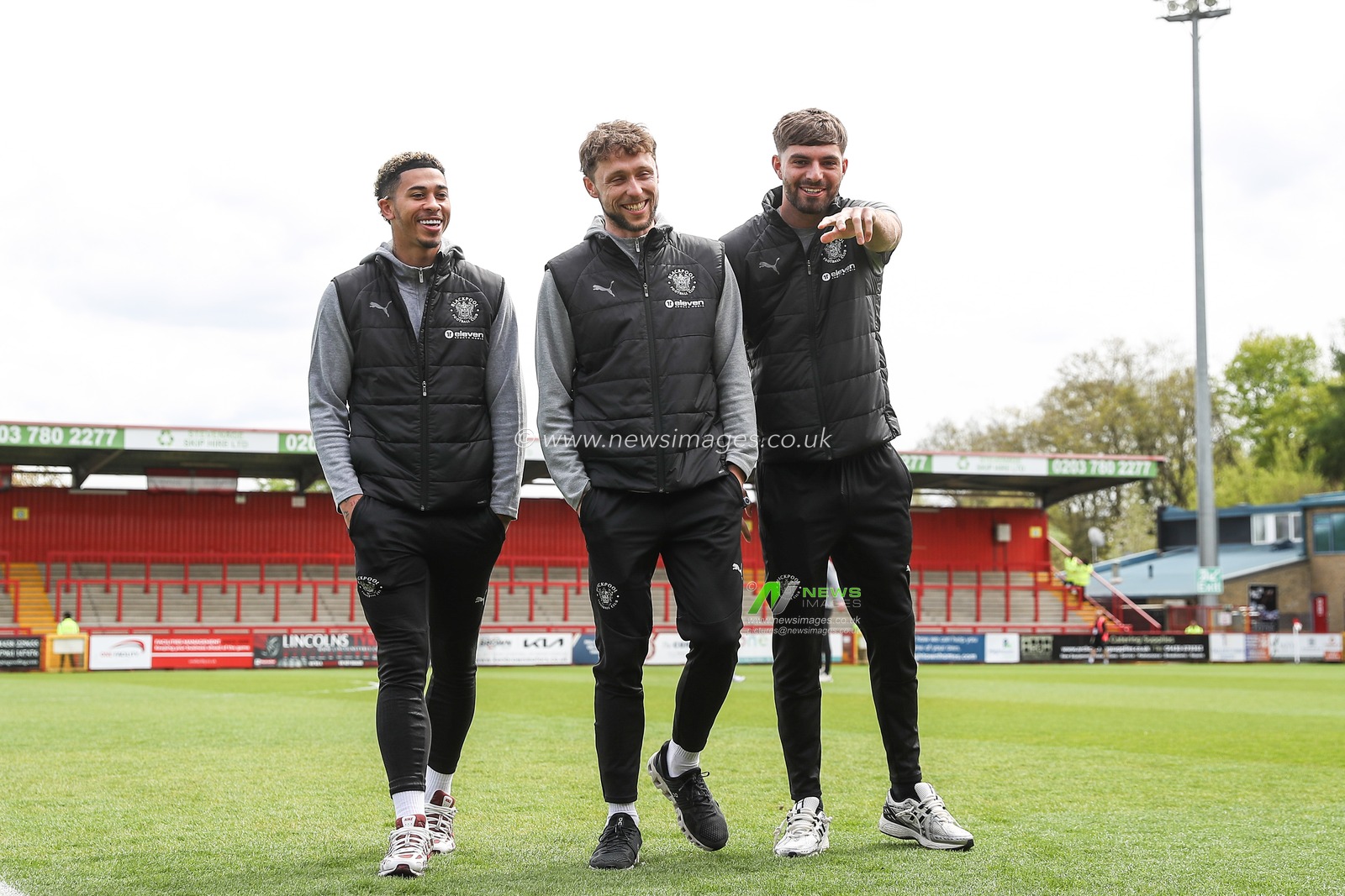Jordan Lawrence-Gabriel of Blackpool, Matthew Pennington of Blackpool and Tom Bloxham of Blackpool arrive ahead of the Sky Bet League 1 match Stevenage vs Blackpool at Lamex Stadium, Stevenage, United Kingdom, 18th April 2025

(Photo by Gareth Evans/News Images)
