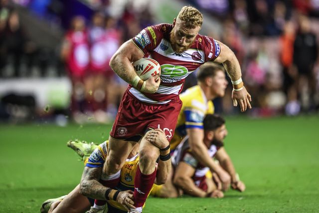 Luke Thompson of Wigan Warriors is tackled during the Betfred Super League round 27 match Wigan Warriors vs Leeds Rhinos at The Brick Community Stadium, Wigan, United Kingdom, 19th September 2025

(Photo by Alfie Cosgrove/News Images)