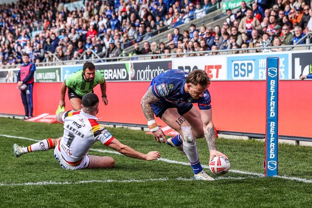 Tom Johnstone of Wakefield Trinity goes over for a try during the Betfred Super League round 8 match Wakefield Trinity vs Bradford Bulls at DIY Kitchens Stadium, Wakefield, United Kingdom on 18 April 2026

(Photo by Alfie Cosgrove/News Images)