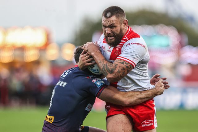 Jared Waerea-Hargreaves of Hull KR is tackled by Alex Walmsley of St. Helens during the Betfred Super League Semi Final 2 match Hull KR vs St Helens at Sewell Group Craven Park, Kingston upon Hull, United Kingdom, 3rd October 2025

(Photo by Alfie Cosgrove/News Images)