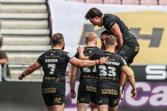 Jordan Rapana of Hull FC celebrates his try during the Betfred Super League Round 19 match Wigan Warriors vs Hull FC at The Brick Community Stadium, Wigan, United Kingdom, 19th July 2025

(Photo by Alfie Cosgrove/News Images)
