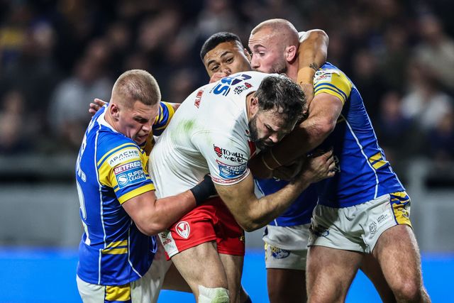 Alex Walmsley of St. Helens is tackled during the Betfred Super League play-off Eliminator 1 match Leeds Rhinos vs St Helens at Headingley Stadium, Leeds, United Kingdom, 27th September 2025

(Photo by Alfie Cosgrove/News Images)