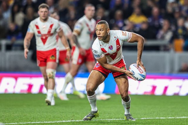 Moses Mbye of St. Helens passes the ball during the Betfred Super League play-off Eliminator 1 match Leeds Rhinos vs St Helens at Headingley Stadium, Leeds, United Kingdom, 27th September 2025

(Photo by Alfie Cosgrove/News Images)