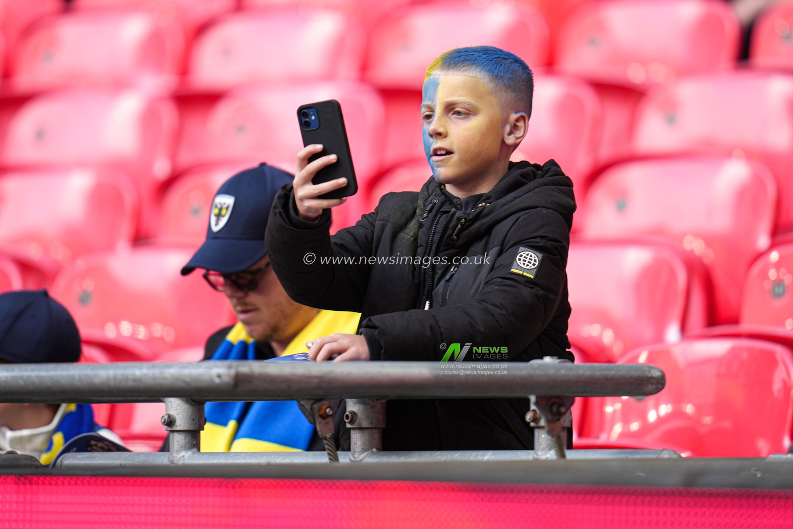 Young Wimbledon fan ahead of the Sky Bet League 2 Playoff Final match AFC Wimbledon vs Walsall at Wembley Stadium, London, United Kingdom, 26th May 2025

(Photo by Harvey Murphy/News Images)