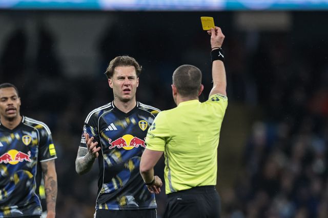 Referee Peter Bankes gives a yellow card to Joe Rodon of Leeds United during the Premier League match Manchester City vs Leeds United at Etihad Stadium, Manchester, United Kingdom, 29th November 2025

(Photo by Mark Cosgrove/News Images)

*** GER AUT SUI OUT ***