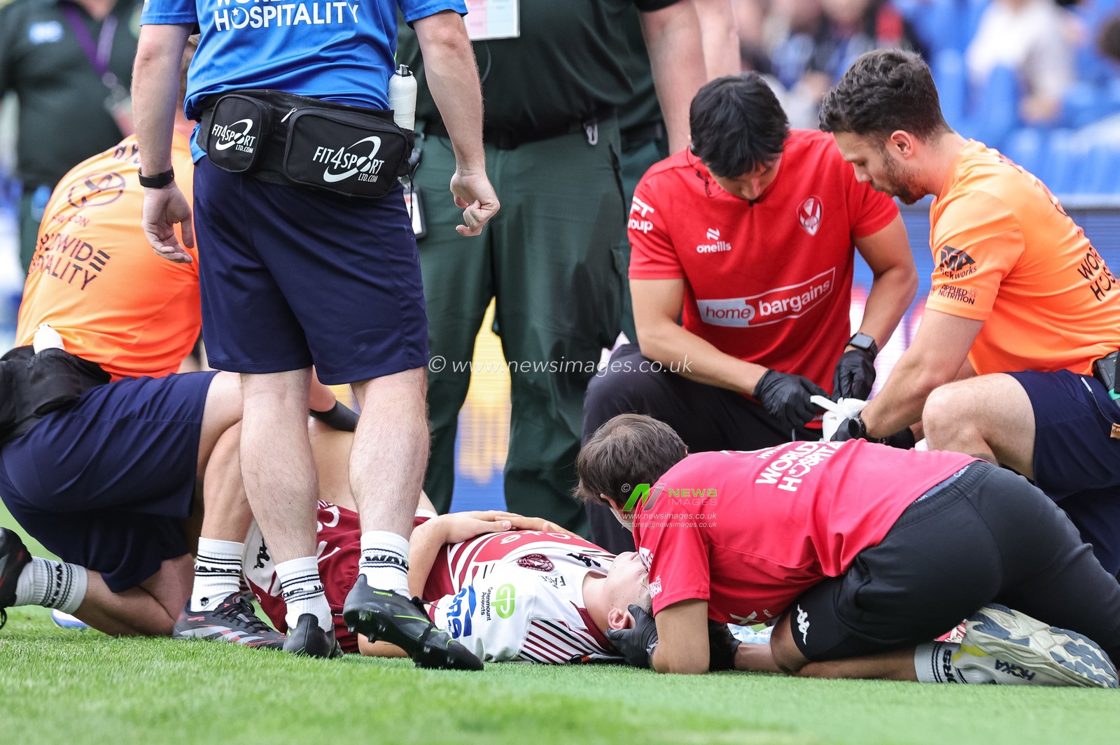 Nathan Lowe of Wigan Warriors receives treatment for a heavy injury during the Betfred Super League Magic Weekend match Wigan Warriors vs St Helens at Hill Dickinson Stadium, Liverpool, United Kingdom on 05 July 2026

(Photo by Mark Cosgrove/News Images)