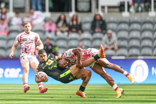 Fouad Yaha of Catalan Dragons is tackled by Edwin Ipape of Leigh Leopards during the Betfred Magic Weekend 2025 match Leigh Leopards vs Catalans Dragons at St. James's Park, Newcastle, United Kingdom, 3rd May 2025

(Photo by Mark Cosgrove/News Images)