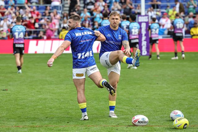 Danny Walker of Warrington Wolves andSam Powell of Warrington Wolves in the pre-game warm up during the Betfred Super League Magic Weekend match Leigh Leopards vs Warrington Wolves at Hill Dickinson Stadium, Liverpool, United Kingdom on 04 July 2026

(Photo by Mark Cosgrove/News Images)
