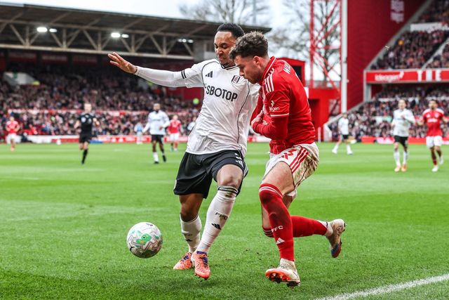 Kenny Tete of Fulham and Neco Williams of Nottingham Forest battle for the ball during the Premier League match Nottingham Forest vs Fulham at City Ground, Nottingham, United Kingdom on 15 March 2026

(Photo by Alfie Cosgrove/News Images)