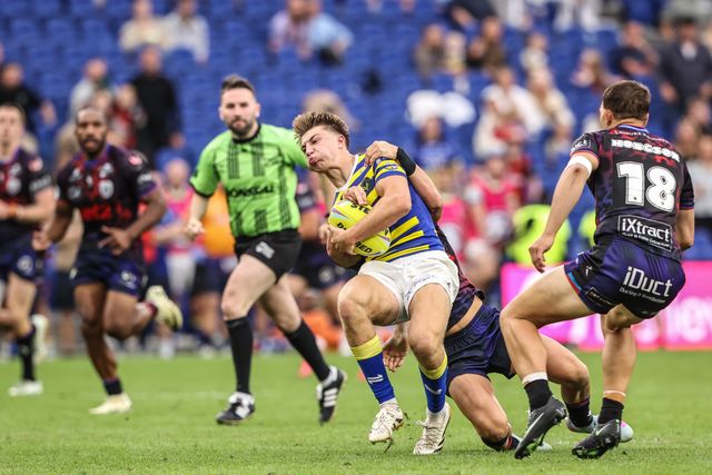 Ewan Irwin of Warrington Wolves is tackled by David Armstrong of Leigh Leopards during the Betfred Super League Magic Weekend match Leigh Leopards vs Warrington Wolves at Leigh Sports Village, Leigh, United Kingdom on 04 July 2026

(Photo by Alfie Cosgrove/News Images)