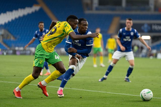 Anthony Musaba of Norwich City and Ronan Kpakio of Cardiff City dual for the ball during the Carabao Cup round 2 match Cardiff City vs Norwich City at Cardiff City Stadium, Cardiff, United Kingdom on 25 August 2026

(Photo by Andrew Lewis/News Images)