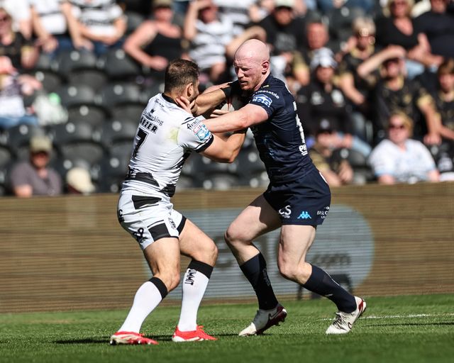 Liam Farrell of Wigan Warriors is tackled by Aidan Sezer of Hull FC during the Betfred Super League Round 9 match Hull FC vs Wigan Warriors at MKM Stadium, Hull, United Kingdom, 27th April 2025

(Photo by Mark Cosgrove/News Images)