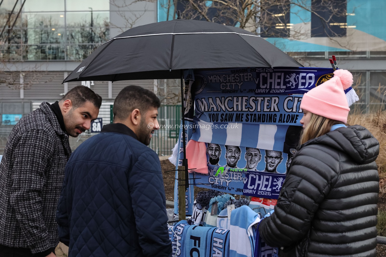 Fans look to buy scarfs during the Premier League match Manchester City vs Chelsea at Etihad Stadium, Manchester, United Kingdom, 4th January 2026

(Photo by Mark Cosgrove/News Images)

*** GER AUT SUI OUT ***