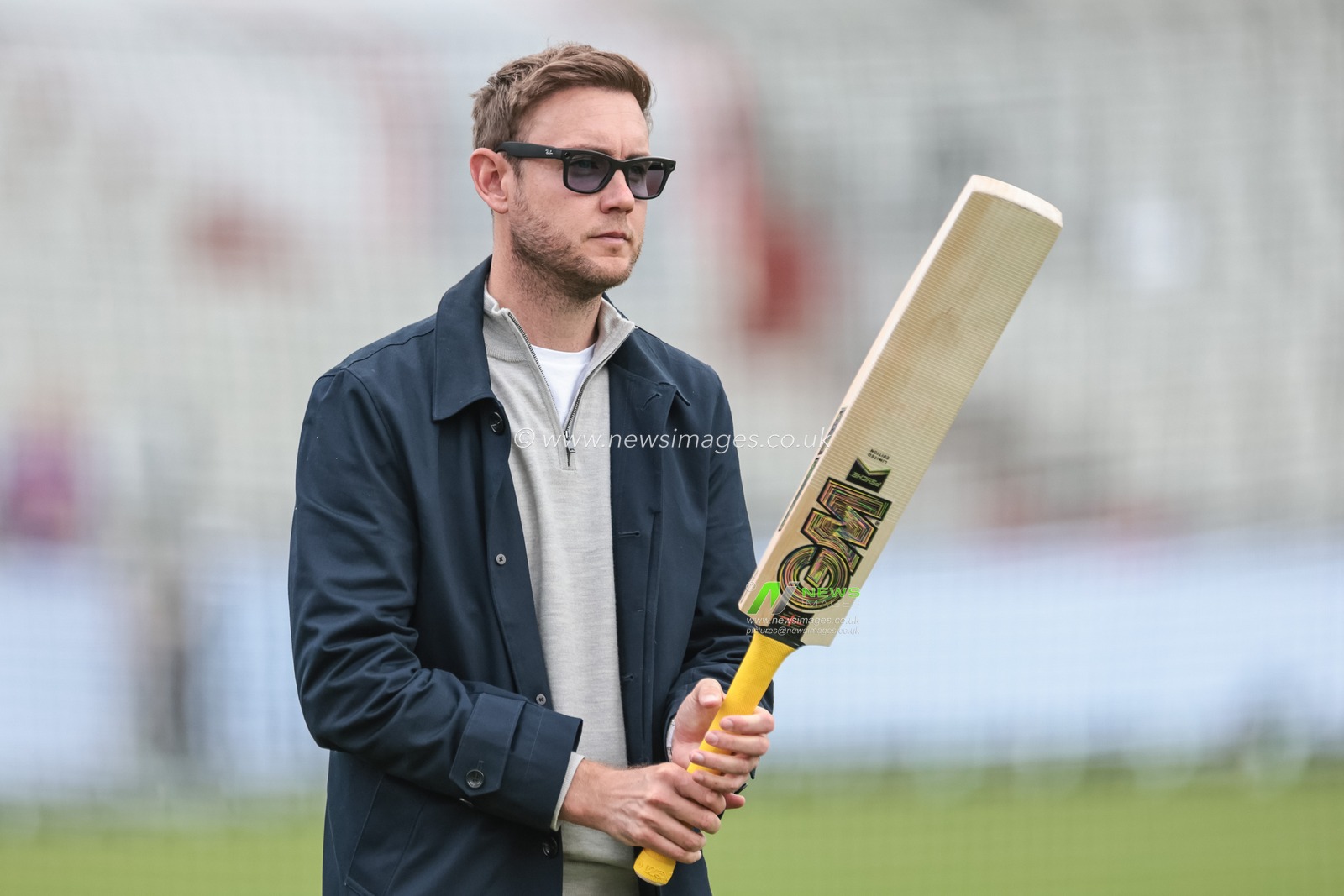 Broadcaster Stuart Broad with the GM cricket bat of Duckett  during the 4th Rothesay Test Match match Day 2 England vs India at Old Trafford Cricket Ground, Manchester, United Kingdom, 24th July 2025

(Photo by Mark Cosgrove/News Images)