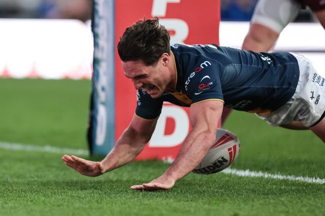 Brodie Croft of Leeds Rhinos goes over for a try during the Betfred Super League round 12 match Leeds Rhinos vs Huddersfield Giants at AMT Headingley Stadium, Leeds, United Kingdom on 22 May 2026

(Photo by Mark Cosgrove/News Images)