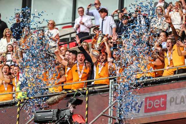 Lewis Coyle of Hull City lifts the Sky Bet Championship Playoff trophy during the Sky Bet Championship Playoffs Final match Hull City vs Middlesbrough at Wembley Stadium, London, United Kingdom on 23 May 2026

(Photo by Alfie Cosgrove/News Images)