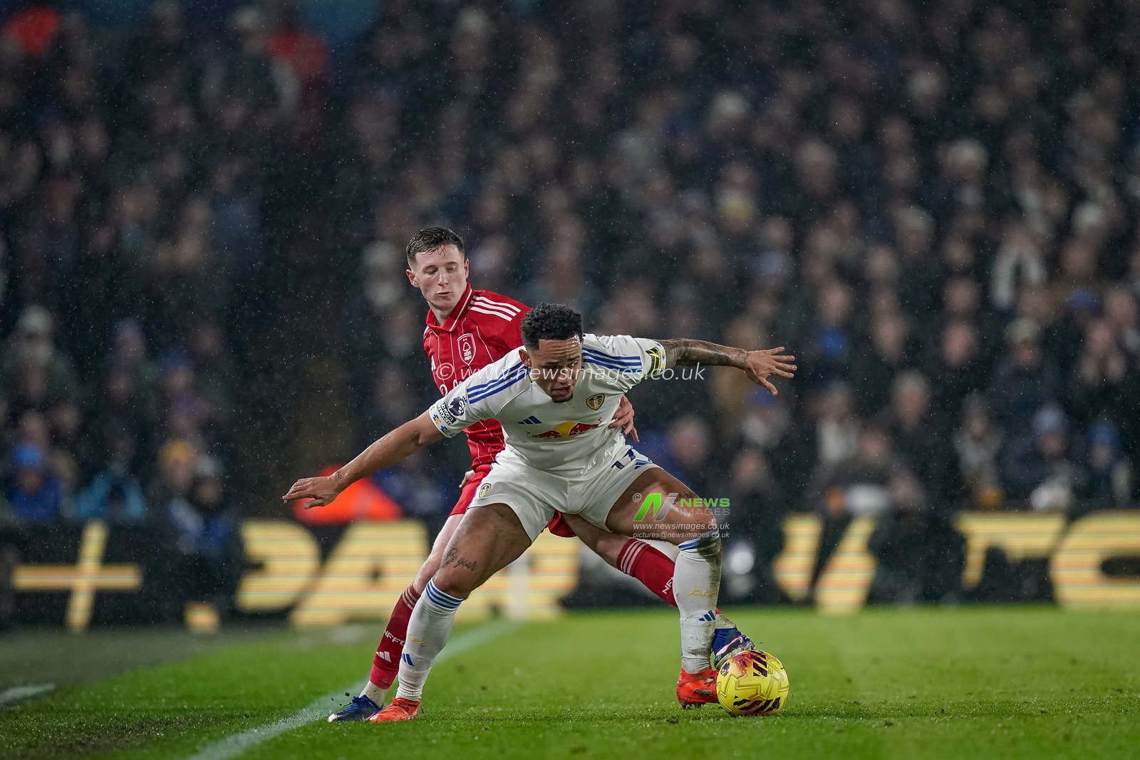 Elliot Anderson of Nottingham Forest is tackled by   Noah Okafor of Leeds United during the Premier League match Leeds United vs Nottingham Forest at Elland Road, Leeds, United Kingdom on 06 February 2026

(Photo by Maynard Manyowa/News Images)