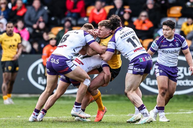 Alex Mellor of Castleford Tigers is tackled by Seth Nikotemo of Wakefield Trinity during the Betfred Super League round 7 match Castleford Tigers vs Wakefield Trinity at OneBore Stadium, Castleford, Untied Kingdom on 05 April 2026

(Photo by Alfie Cosgrove/News Images)