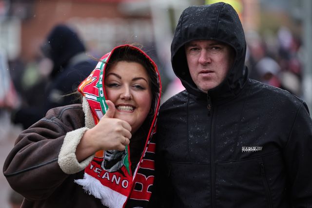 Manchester United fans make their way to Old Trafford during the Premier League match Manchester United vs Aston Villa at Old Trafford, Manchester, United Kingdom on 15 March 2026

(Photo by Mark Cosgrove/News Images)