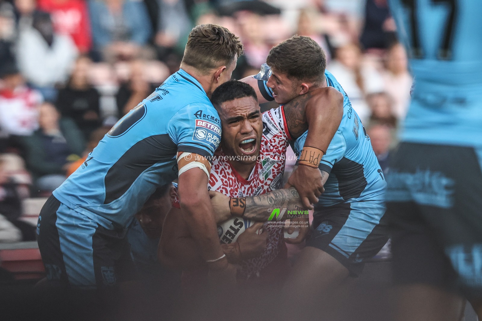 Joe Ofahengaue of Leigh Leapords is tackled during the Betfred Super League Round 12 match Leigh Leopards vs Hull FC at Leigh Sports Village, Leigh, United Kingdom, 22nd May 2025

(Photo by Alfie Cosgrove/News Images)