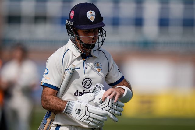 Dejected Wayne Madsen walks off after being caught by Ed Middleton off the bowling of Will Williams during the County Championship Division Two Derbyshire v Gloucestershire at The Central Co-Op County Ground, Derby, United Kingdom on 26 April 2026

(Photo by Maynard Manyowa/News Images)