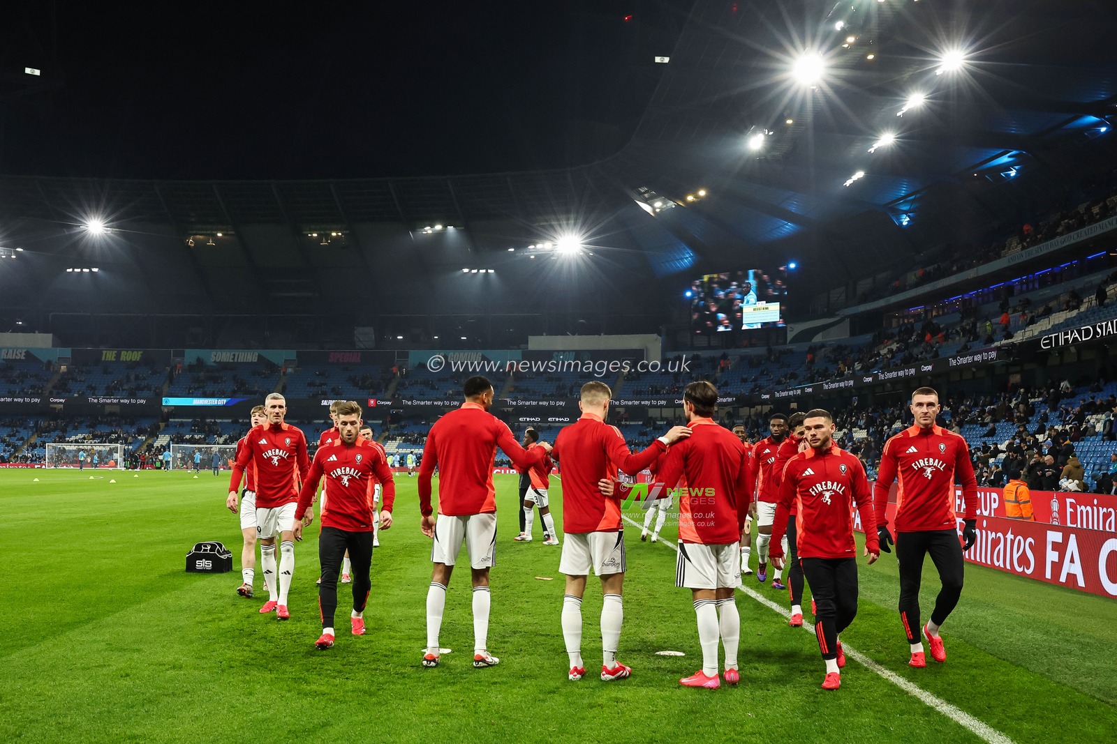 Salford players during the pre-game warmup ahead of the Emirates FA Cup 3rd Round match Manchester City vs Salford City at Etihad Stadium, Manchester, United Kingdom, 11th January 2025

(Photo by Mark Cosgrove/News Images)