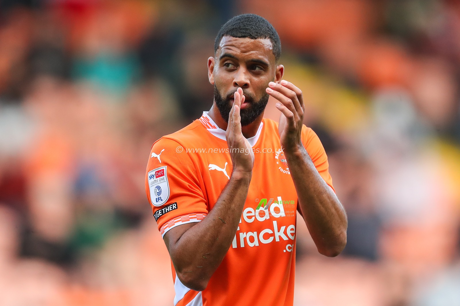 CJ Hamilton of Blackpool applauds the home fans during the Sky Bet League 1 match Blackpool vs Exeter City at Bloomfield Road, Blackpool, United Kingdom, 14th September 2024

(Photo by Gareth Evans/News Images)