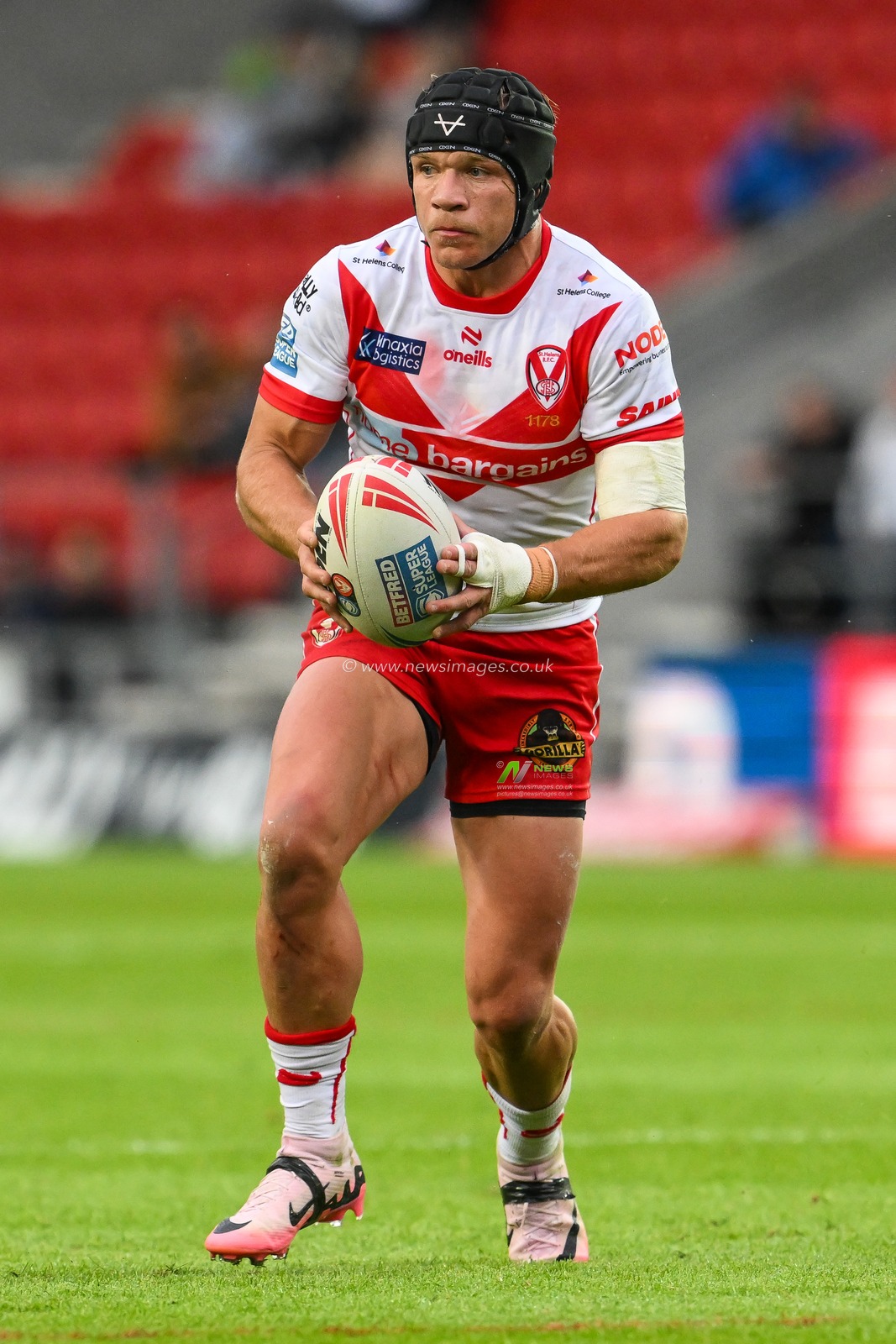 Jonny Lomax of St. Helens makes a break during the Betfred Super League Round 16 match St Helens vs Castleford Tigers at Totally Wicked Stadium, St Helens, United Kingdom, 5th July 2024

(Photo by Craig Thomas/News Images)