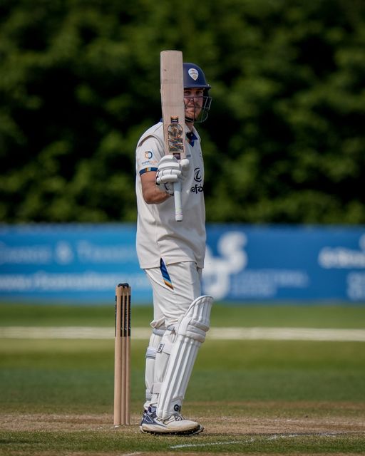 Matthew Montgomery raises his bat towards the pavilion after scoring a half century during the County Championship Division Two Derbyshire v Gloucestershire at The Central Co-Op County Ground, Derby, United Kingdom on 26 April 2026

(Photo by Maynard Manyowa/News Images)