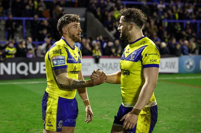 Matty Ashton of Warrington Wolves and Toby King of Warrington Wolves shake hands during the Betfred Super League Round 2 match Warrington Wolves vs Catalans Dragons at Luke Littler Stadium, Warrington, United Kingdom, 21st February 2025

(Photo by Mark Cosgrove/News Images)