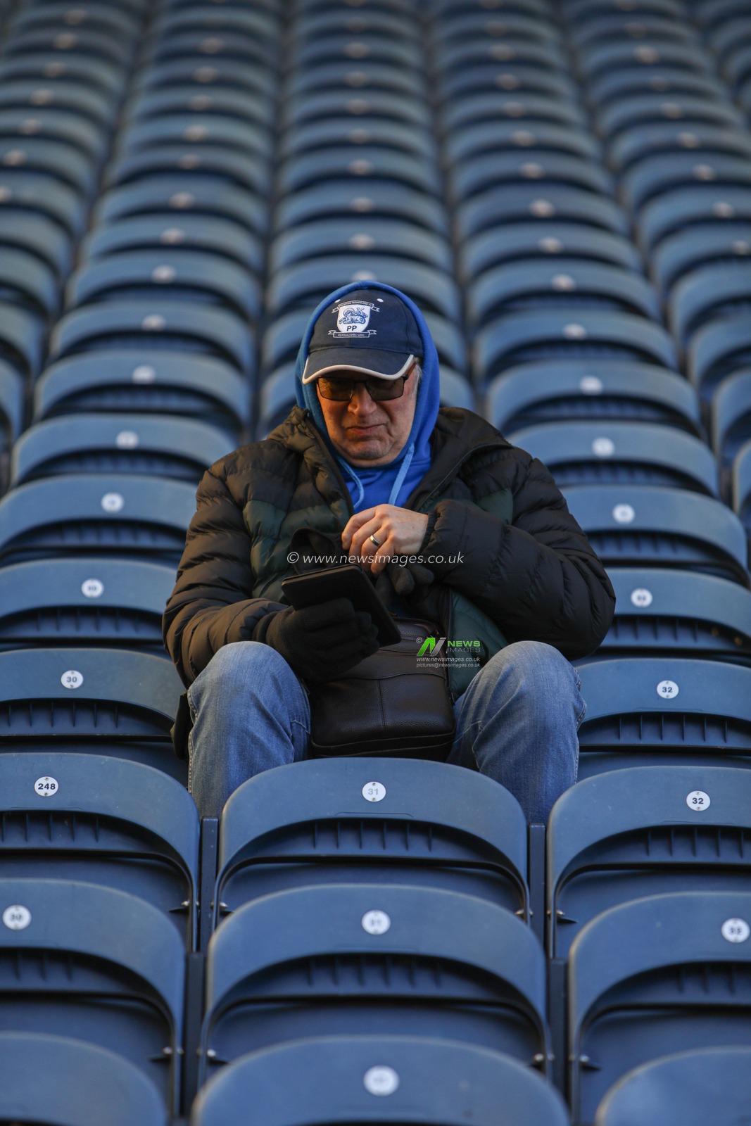 Preston North End fan takes seat ahead of the Sky Bet Championship match Preston North End vs Middlesbrough at Deepdale, Preston, United Kingdom, 25th January 2025

(Photo by Jorge Horsted/News Images)
