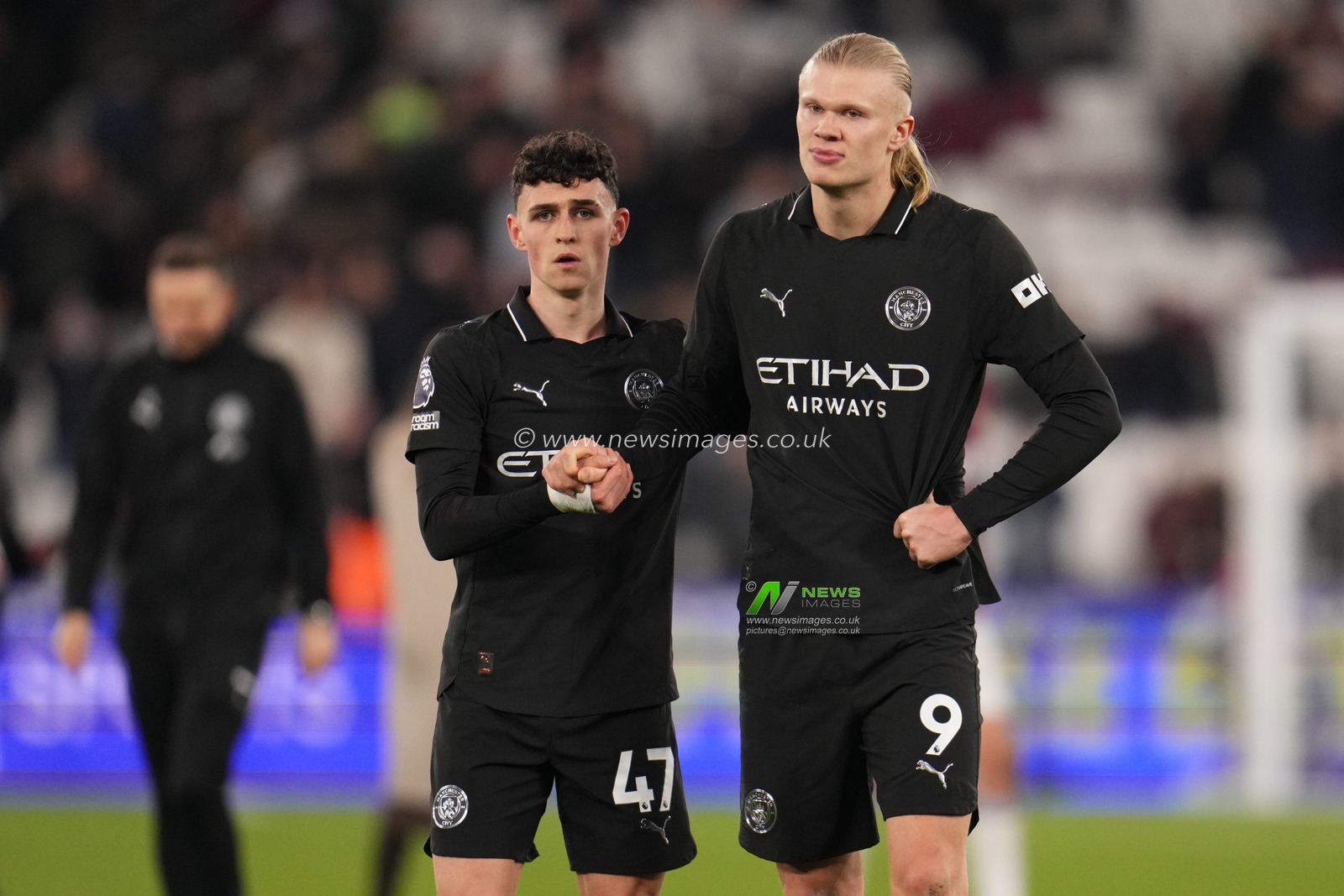 Erling Haland of Manchester City and Phil Foden of Manchester City at full time during the Premier League match West Ham United vs Manchester City at London Stadium, London, United Kingdom on 14 March 2026

(Photo by Harvey Murphy/News Images)