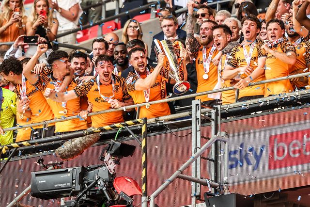 Lewis Coyle of Hull City lifts the Sky Bet Championship Playoff trophy during the Sky Bet Championship Playoffs Final match Hull City vs Middlesbrough at Wembley Stadium, London, United Kingdom on 23 May 2026

(Photo by Alfie Cosgrove/News Images)