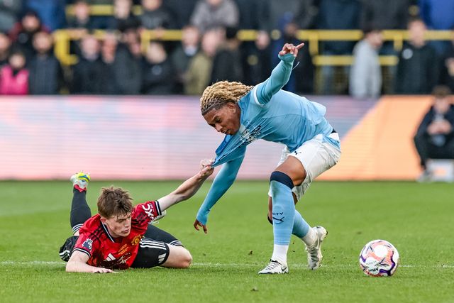 Tyrone Samba of Manchester City U18's is fouled by Rafe Mccormack of Manchester United U18's during the FA Youth Cup Final match Manchester City U18 vs Manchester United U18 at Joie Stadium, Manchester, United Kingdom on 14 May 2026

(Photo by Mark Cosgrove/News Images)