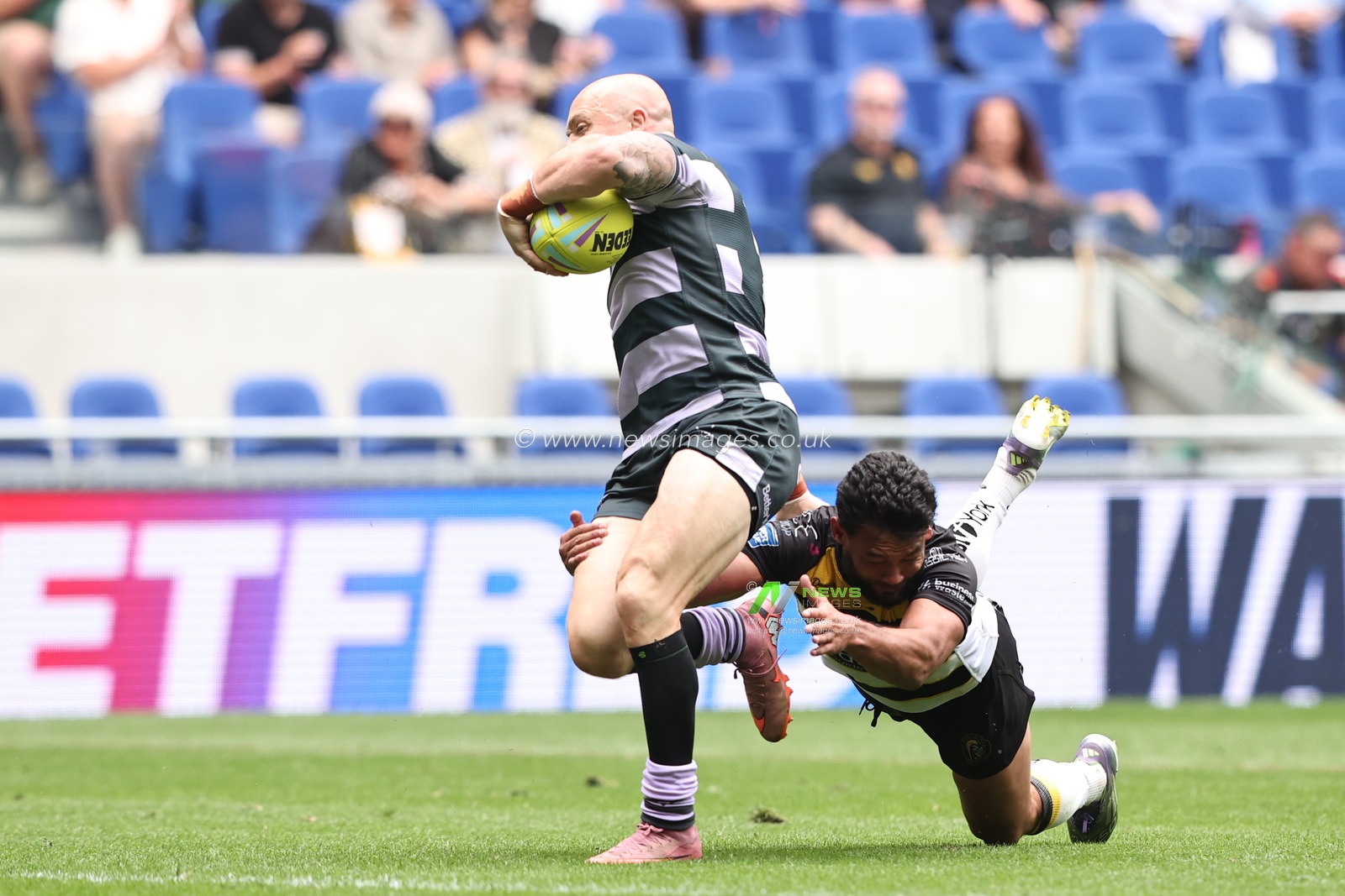 Adam Swift of Huddersfield Giants is tackled by David Nofoaluma of York Knights during the Betfred Super League Magic Weekend match Huddersfield Giants vs York Knights at Hill Dickinson Stadium, Liverpool, United Kingdom on 04 July 2026

(Photo by Alfie Cosgrove/News Images)