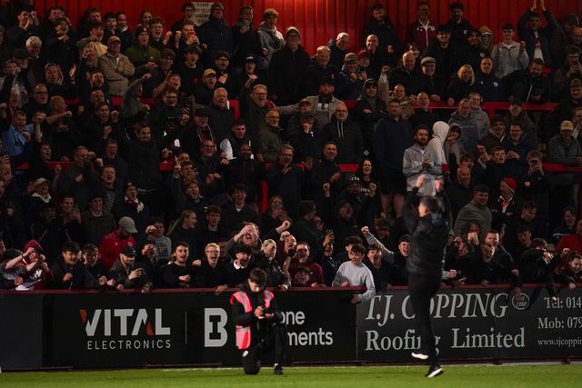 Stevenage fans celebrate with Alex Revell manager of Stevenage after crucial 1-0 win during the Sky Bet League One match Stevenage vs Barnsley at Lamex Stadium, Stevenage, United Kingdom on 21st April 2026

(Photo by Harvey Murphy/News Images)