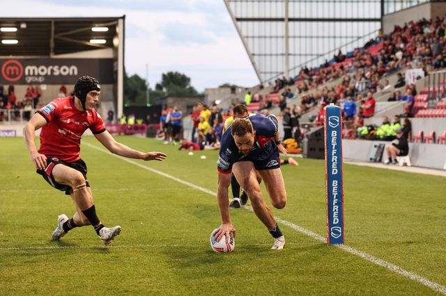 Joe Burgess of Hull KR goes over for a hat-trick of try’s during the Betfred Super League Round 20 Salford Red Devils vs Hull KR at Salford Community Stadium, Eccles, United Kingdom, 31st July 2025

(Photo by Mark Cosgrove/News Images)