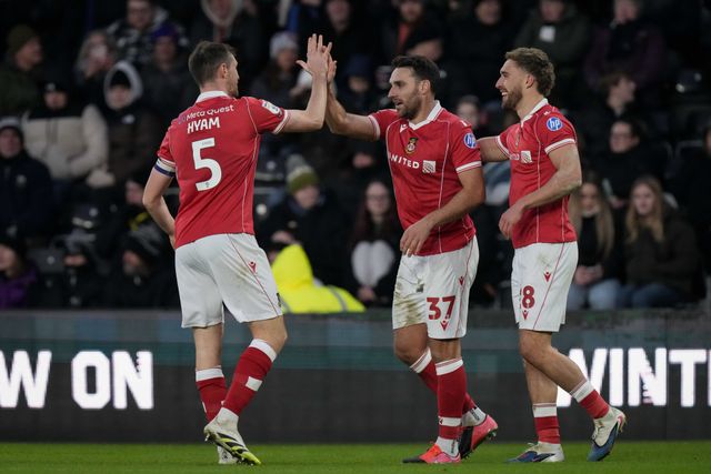 Matthew James of Wrexham celebrates his goal to make it 1-2 with Dominic Hyam of Wrexham and Sam Smith of Wrexham vduring the Sky Bet Championship match Derby County vs Wrexham at Pride Park Stadium, Derby, United Kingdom, 4th January 2026

(Photo by Maynard Manyowa/News Images)

*** GER AUT SUI OUT ***