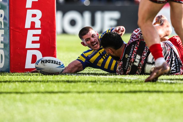 Danny Walker of Warrington Wolves celebrates his try during the Betfred Challenge Cup Quarter Final match Warrington Wolves vs Leigh Leopards at The Halliwell Jones Stadium, Warrington, United Kingdom on 11 April 2026

(Photo by Alfie Cosgrove/News Images)