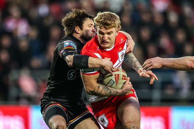 George Delaney of St Helens is tackled by Joe Mellor of Bradford Bulls during the Betfred Super League round 4 match St Helens vs Bradford Bulls at The BrewDog Stadium, St Helens, United Kingdom on 07 March 2026

(Photo by Alfie Cosgrove/News Images)
