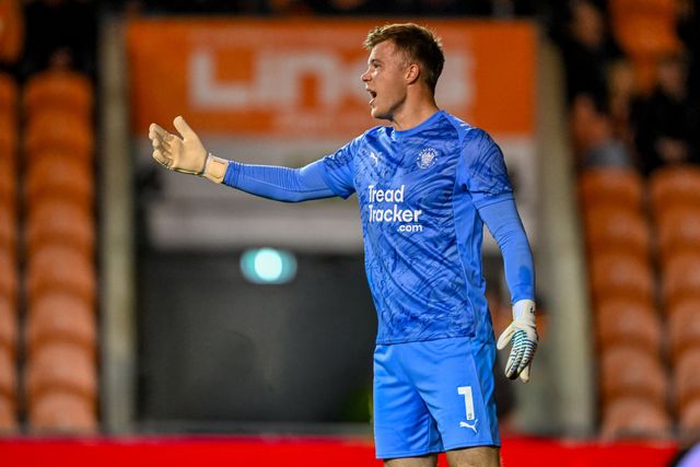 Bailey Peacock-Farrell of Blackpool  shouts to team mates with arm outstretched during the Sky Bet League 1 match Blackpool vs Luton Town at Bloomfield Road, Blackpool, United Kingdom, 30th September 2025

(Photo by Adam Gee/News Images)