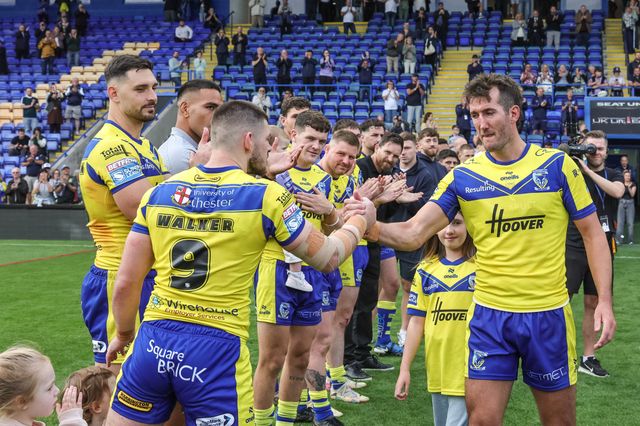Stefan Ratchford of Warrington Wolves walks out for one last time as players and staff form a guard of honour on his last ever home game as he announces his retirement during the Betfred Super League Round 25 match Warrington Wolves vs Leigh Leopards at Halliwell Jones Stadium, Warrington, United Kingdom, 6th September 2025

(Photo by Mark Cosgrove/News Images)