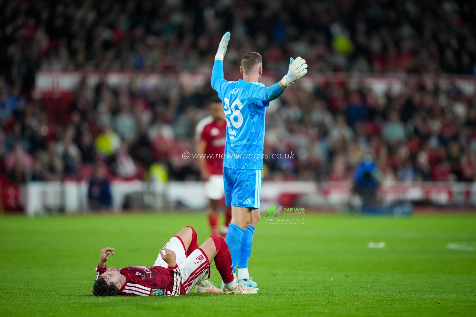 Neco Williams of Nottingham Forest  goes down with a potential injury and is substituted during the Carabao Cup round 2 match Nottingham Forest vs Leeds Rhinos at City Ground, Nottingham, United Kingdom on 25 August 2026

(Photo by Maynard Manyowa/News Images)