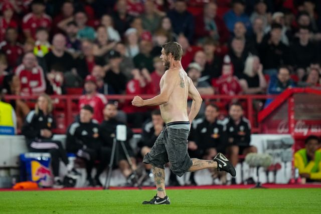 A fan enters the field of play and is tackled and ejected by security during the Carabao Cup round 2 match Nottingham Forest vs Leeds Rhinos at City Ground, Nottingham, United Kingdom on 25 August 2026

(Photo by Maynard Manyowa/News Images)