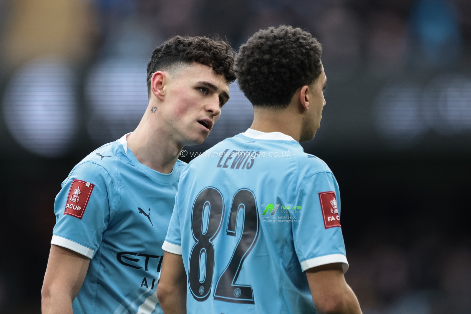 Phil Foden of Manchester City speaks to Rico Lewis of Manchester City during the Emirates FA Cup 4th Round match Manchester City vs Salford City at Etihad Stadium, Manchester, United Kingdom on 14 February 2026

(Photo by Mark Cosgrove/News Images)