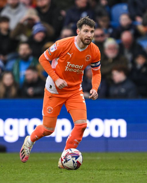 James Husband of Blackpool makes a break with the ball during the Sky Bet League 1 match Stockport County vs Blackpool at Edgeley Park Stadium, Stockport, United Kingdom, 1st March 2025

(Photo by Craig Thomas/News Images)